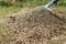 stock photo cleaning up the grass with a rake aerating and scarifying the lawn in the garden 5