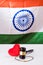 Stock photo of concept of breakup or divorce in India showing Gavel, stuffed red heart, mangalsutra or necklace which is a typical