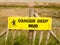 Stock Photo - a danger deep mud yellow rectangle sign outside se