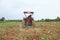 Stock Photo: Farmer was drove tractor plowing the soil to picup