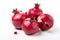 stock photo of fresh Pomegranates on a pristine white background