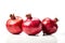 stock photo of fresh Pomegranates on a pristine white background