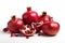 stock photo of fresh Pomegranates on a pristine white background