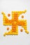 Stock photo of hindu auspicious symbol called Swastika made using marigold flower or zendu or genda phool, Flower rangoli in the s