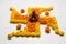 Stock photo of hindu auspicious symbol called Swastika or swastik made using marigold flower/zendu/genda phool & diwali diya / cla