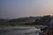 Stock photo of holy Bhima river bank near lord Mallaya temple, people taking ritual bath early