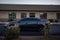 Stock photo showcases a black Toyota Avalon sedan parked on the street