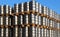 Stock of steel kegs of beer in factory yard