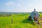 Stock tank in a meadow in sunlight in autumn