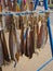 Stockfish hanging on a rack on a market