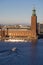 Stockholm City Hall, Stockholm Municipality in Kungsholmen island with touristic boat in front.