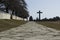 Stockholm / Sweden - 14 Febrary 2018: Road leading up to the granite cross, at the UNESCO world heritage The Woodland Cemetery