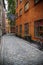 STOCKHOLM, SWEDEN - AUGUST 19, 2016: View of old narrow Kindstugatan street and colorful buildings in Gamla Stan, Gamla Stan is o