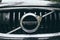 Stockholm, Sweden - August 2017: Close-up of Volvo car emblem covered with rain drops