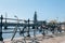 Stockholm, Sweden - May 1, 2019 : Scenic sunny day panorama of city quay with bicycles and City Hall, The Old Town in