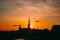 Stockholm, Sweden. Sunset Sun Shine Through Dark Silhouette Of Riddarholm Church In Stockholm Skyline. Scenic View Of