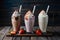 StockImage An indulgent display of three milkshakes including chocolate and strawberry