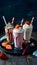 StockImage An indulgent display of three milkshakes including chocolate and strawberry