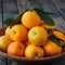 StockImage Pile of fresh organic oranges in brown basket, healthy fruit