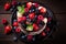 StockImage Top view chocolate cake with berries on a black background