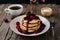 StockImage Warm pancake served with blackberry syrup captured in foodgraphy