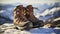 stockphoto, Hiker\\\'s Boots in the snow. Empty used hiking boots standing on the soil in a snowy landscape