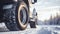 stockphoto, Winter tire. truck on snow road. Tires on snowy highway detail. close up view. Copy space.