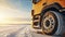 stockphoto, Winter tire. truck on snow road. Tires on snowy highway detail. close up view. Copy space.
