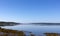 Stockton Springs Maine harbor with coast and boats