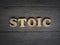 Stoicism word, stoic lifestyle concept, written on wooden