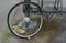 Stolen bicyle wheel still locked at stand