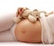 Stomach pregnant woman on white background