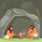 Stone age couple cooking meat vector illustration