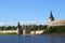 Stone ancient Pskov Krom Kremlin Fort fortress view from the river from afar in Russia