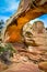 Stone arch under a trail walk in the Capitol reef National Park, Utah USA