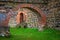 Stone arch and wall in internal courtyard