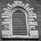 Stone Architecture around Screened Window