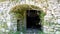 Stone archway, entrance to storeroom - Old Perithia, Corfu