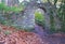 Stone Archway on Pathway in Parkland