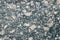 Stone Background of mottled granite igneous rock used for kitchen worktops etc.