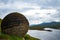 Stone ball above loch