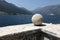 Stone ball on the parapet of the ancient terrace