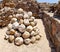 Stone balls for  catapult from the time of the Crusades in the fortress of the Crusaders in the Apollonia National Park in Israel