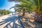 Stone beach on Brac island with turquoise clear ocean water, Supetar, Brac, Croatia