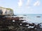 Stone beach and cape on english channel