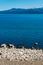 Stone beach and the mountains. Nahuel Huapi Lake. Bariloche