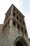 The stone bell tower of the Saint-BarthÃ©lÃ©my church in Cahors, France