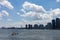 Stone with Birds in the East River and Belmont Island in the distance with a Manhattan Skyline view in New York City during Summer