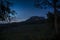 The stone of Bismantova seen from the surroundings at blue hour