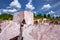 The stone blocks of pink marble